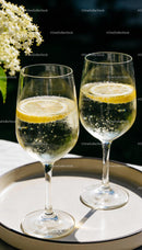 Refreshing Sparkling Water with Lemon Slices in Wine Glasses