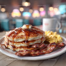 Delicious Breakfast Sandwich with Pancakes Bacon and Eggs