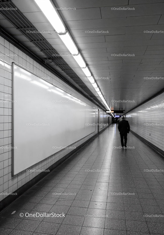 Minimalist Subway Tunnel with Tiled Walls and Modern Lighting