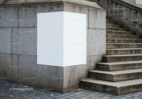 Blank White Poster on Urban Stone Wall Corner