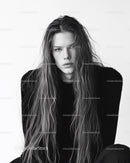 Black and White Portrait of Young Woman with Wavy Hair