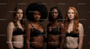 Diverse women in black lingerie standing confidently