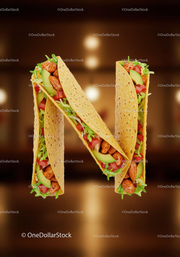 Letter N Formed by Delicious Chicken Tacos with Fresh Veggies