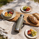 Assorted Fresh Fruits and Rustic Bread on Picnic Blanket