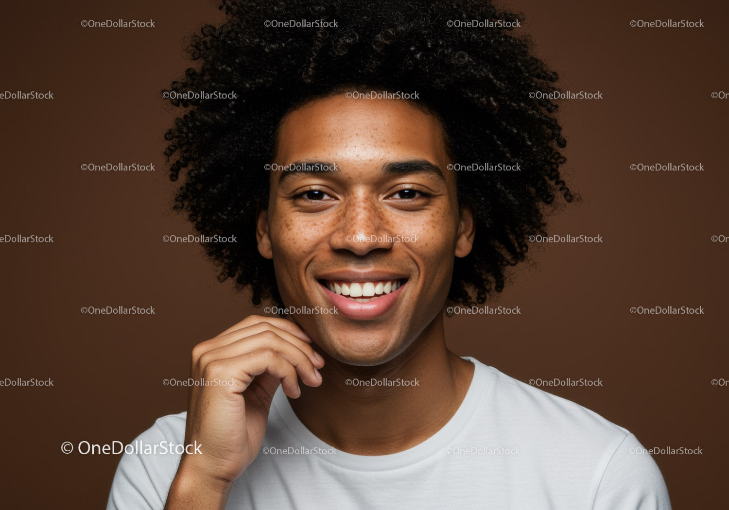 Happy Young Woman with Afro Hair Smiling in Studio Portrait