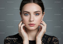 Elegant Woman Portrait with Clear Skin and Blue Eyes