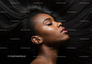 Peaceful woman lying with long flowing black hair