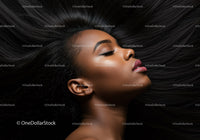 Peaceful woman lying with long flowing black hair