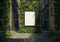 Blank signboard framed by lush green ivy in narrow alley