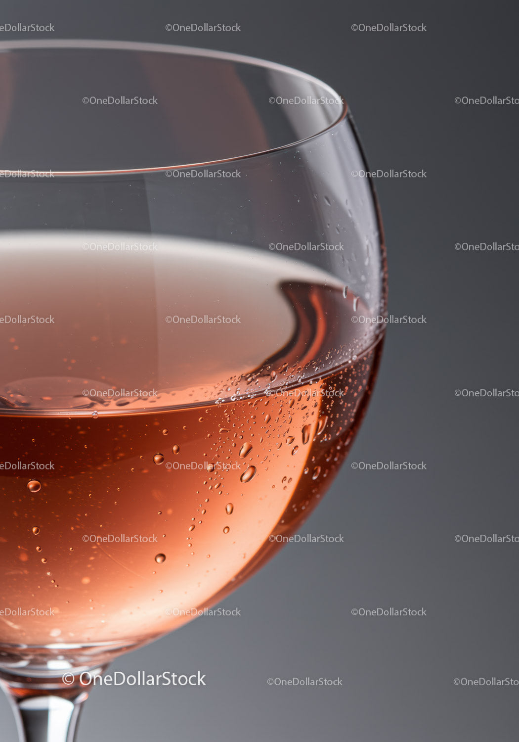 Close-up of chilled rosé wine in elegant glass