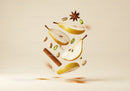 Floating sliced pears with spices and nuts on beige