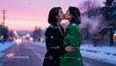 Winter Evening Kiss Between Two Women in Stylish Coats