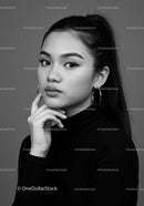 Elegant Black and White Portrait of a Young Woman with Bold Makeup