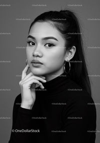 Elegant Black and White Portrait of a Young Woman with Bold Makeup