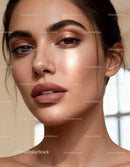 Close up of a woman with flawless makeup and glowing skin
