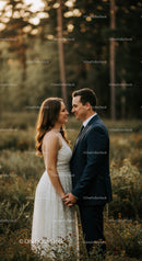 Couple Sharing a Tender Moment in Forest Clearing