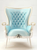 Elegant Vintage Armchair with Pastel Blue Upholstery and Ornate Design