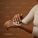Close-Up of Hands Applying Moisturizer on Skin for Smooth Skin
