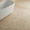 Contemporary White Bathtub on Beige Terrazzo Floor in Modern Bathroom