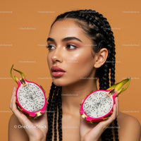 Young Woman with Braided Hair Holding Fresh Dragon Fruits