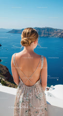 Woman in Floral Dress Enjoying Ocean View from Balcony