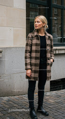 Stylish Woman in Plaid Coat Standing on Urban City Street