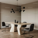 Minimalist Wooden Dining Table with Black Chairs and Modern Chandelier