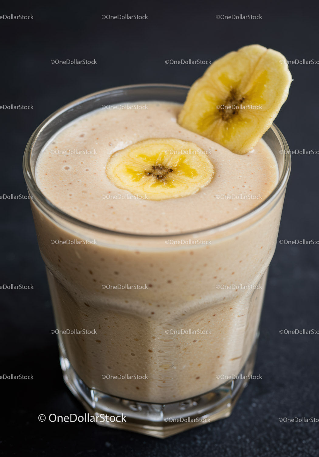 Creamy banana smoothie with dried banana garnish