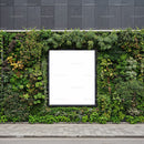 Vertical garden wall with blank advertising space outdoors