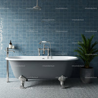 Classic freestanding bathtub in stylish blue bathroom