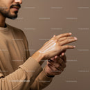 Close-up of a Man Applying Moisturizing Lotion on Hands for Skin Care