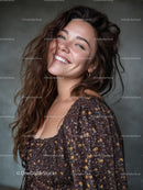 Portrait of a Smiling Woman with Blue Eyes and Curly Brown Hair