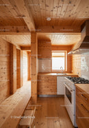 Warm Wooden Kitchen with Natural Wood Cabinets and Gas Stove
