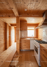 Warm Wooden Kitchen with Natural Wood Cabinets and Gas Stove