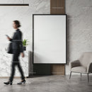 Modern office lobby with blank poster and businesswoman