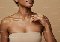Elegant Woman Applying Body Lotion for Healthy Skin