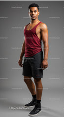 Stylish Young Male in Athletic Tank Top and Shorts in Studio