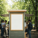 People enjoying coffee at outdoor kiosk in park