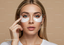 Beautiful Woman Applying Eye Patches for Skincare Routine