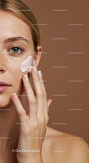 Close-Up of Woman Applying Face Cream Highlighting Skincare Routine