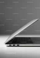 Silver Laptop on White Surface with Gray Background