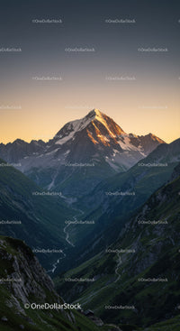 Majestic Snow-Capped Mountain Peak at Sunrise with Verdant Valley