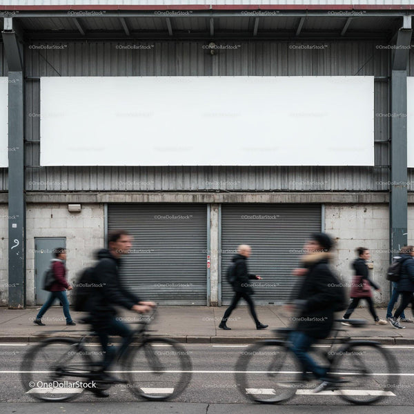 Urban commuters walking and cycling past industrial facade JPG Mockup Image