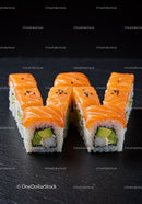 Fresh salmon avocado sushi rolls arranged in letter W
