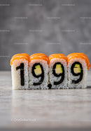 Sushi Rolls Arranged as 1999 Number on Grey Surface