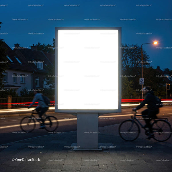 Illuminated blank billboard on urban street at night JPG Mockup Image