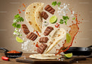 Flying steak tacos with fresh herbs and lime wedges