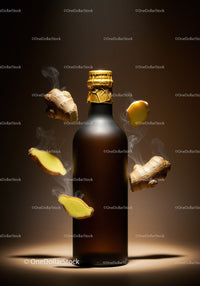 Dark Bottle with Floating Fresh Ginger Slices and Steam