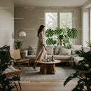 Elegant Woman Walking in a Modern Living Room with Plants