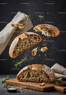 Rustic Sourdough Bread with Herbs and Flour Dust